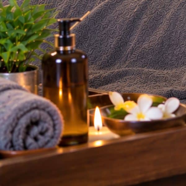 Oil and flower bowl on a spa tray