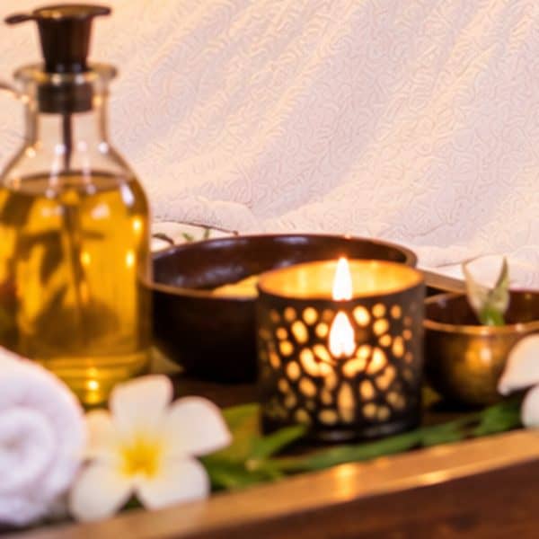 Aromatherapy candle lantern and plumeria flowers