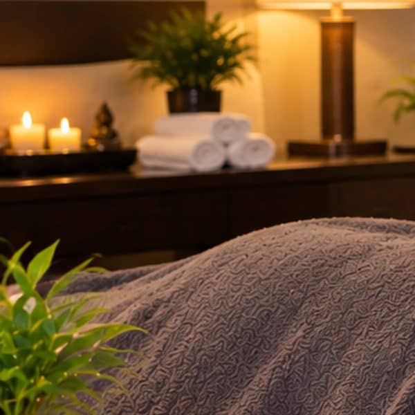 Fresh rolled spa towels and warm candles